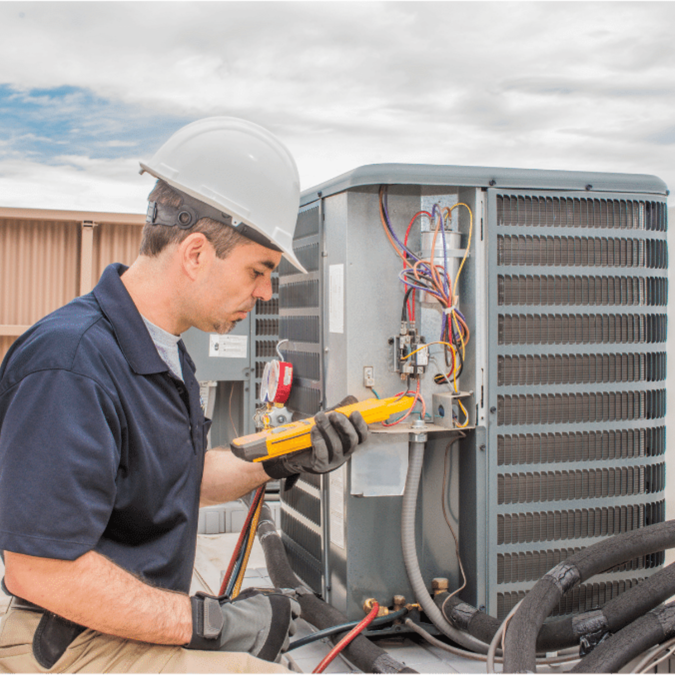 Nanticoke Heating & Cooling HVAC technician servicing a system