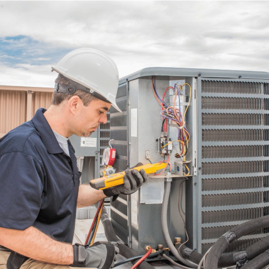 Nanticoke Heating & Cooling HVAC technician servicing a system